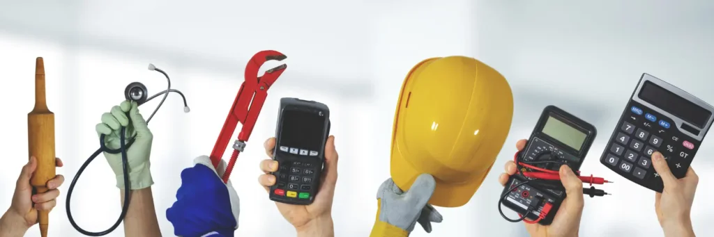 Several hands hold various tools, including a rolling pin, stethoscope, wrench, payment terminal, hard hat, multimeter, and calculator, against a light background
